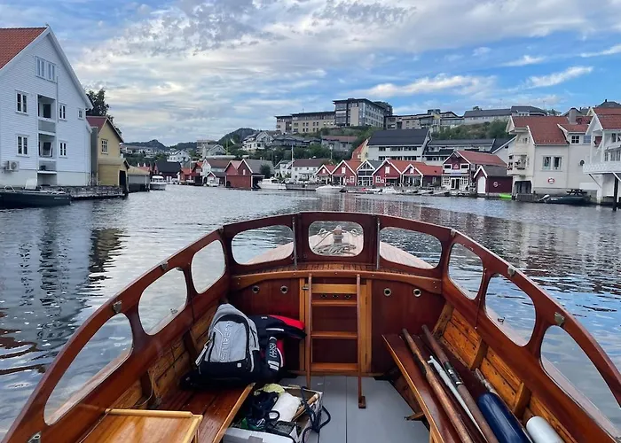 House By The River In
