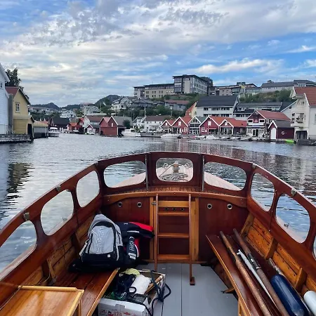 House By The River In